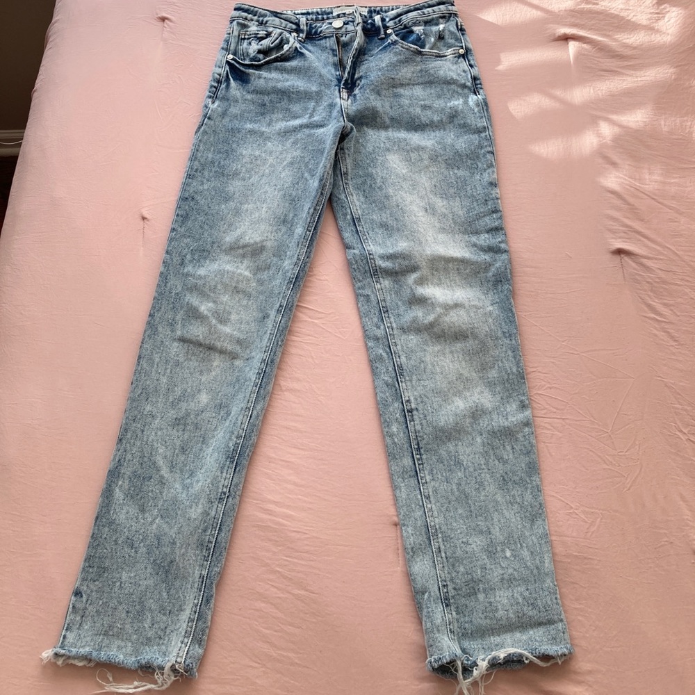 -Acid wash mid-blue jeans; size 3